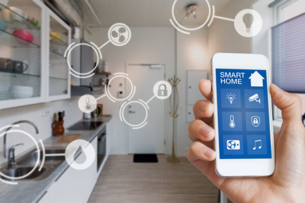 Smart home technology interface on smartphone app screen with augmented reality (AR) view of internet of things (IOT) connected objects in the apartment